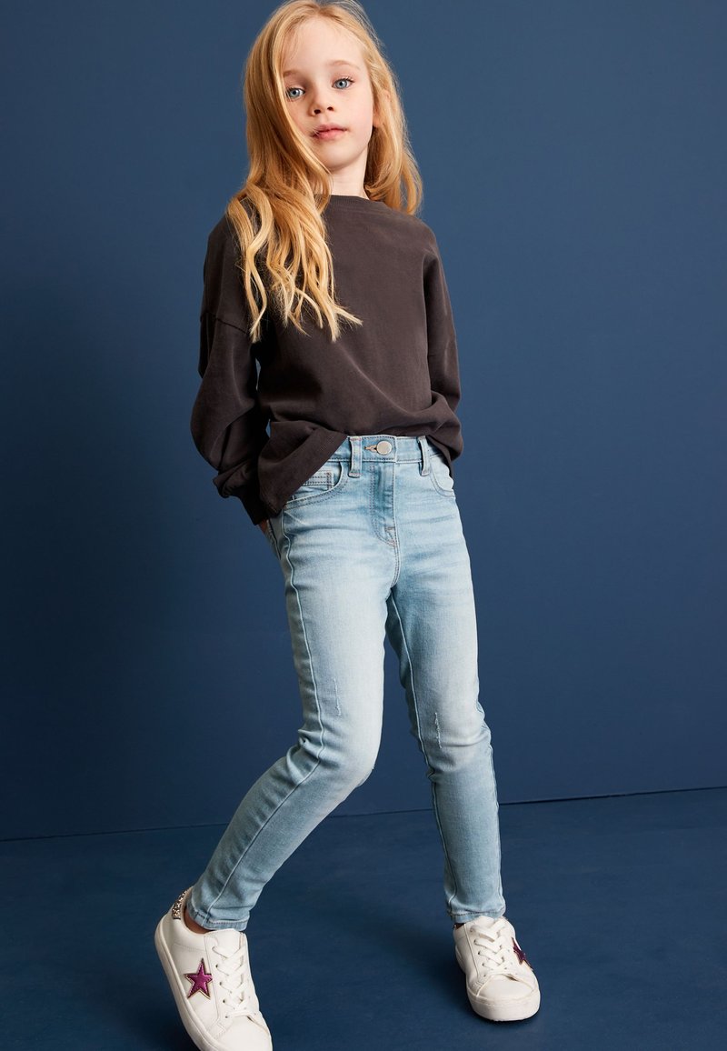 Next Kavbojke slim fit - light blue
