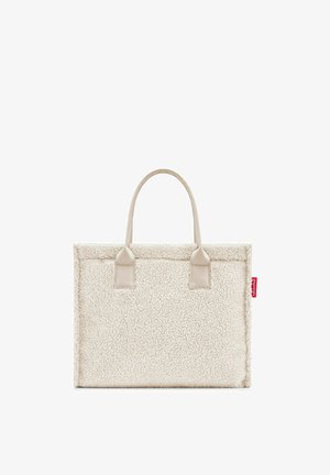 White, textured tote bag with plush exterior and beige handles. Features rectangular shape and minimal branding tag on the side.