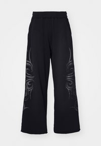 WASHED TATTOO MONSTER JOGGER UNISEX - Tracksuit bottoms - black