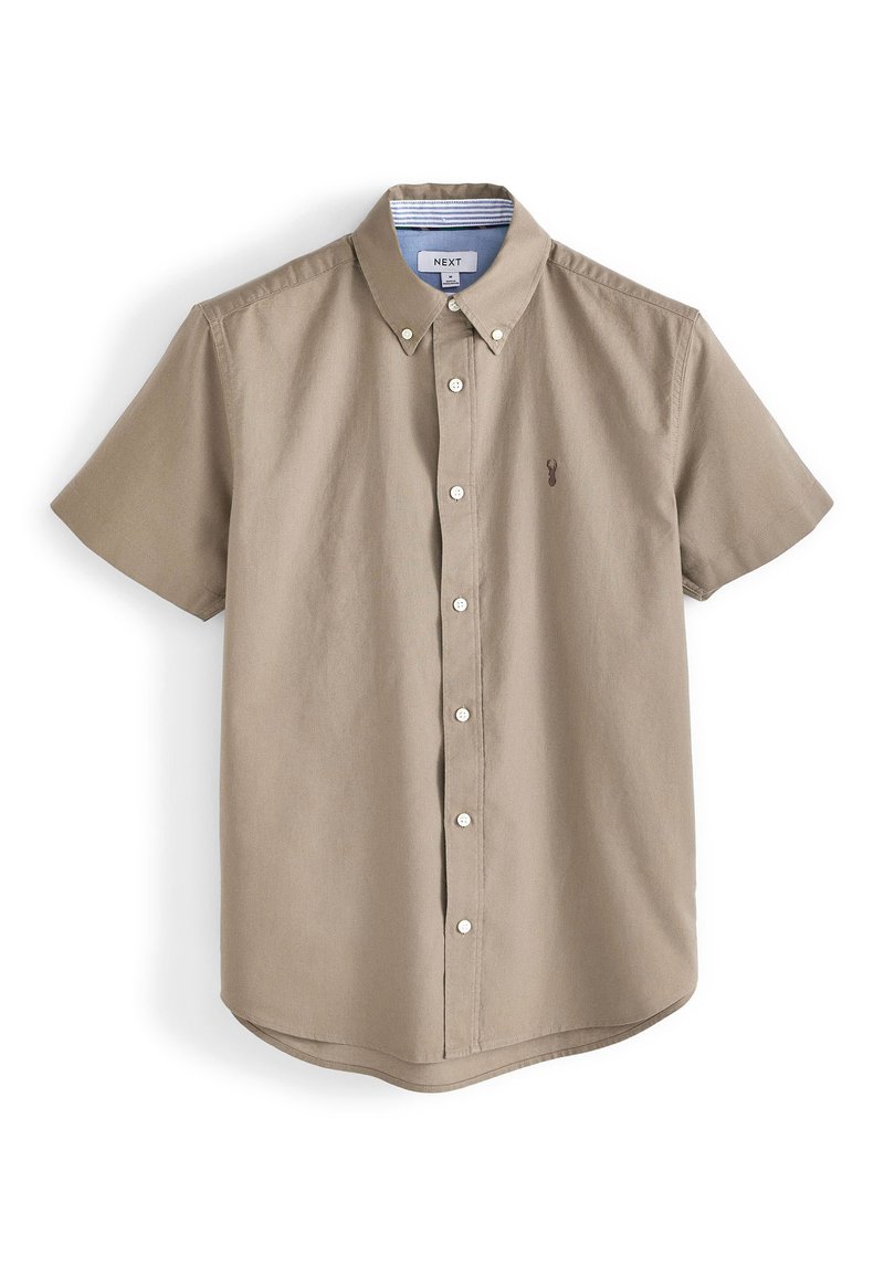 Chemise à manches courtes en coton beige. Équipée de boutons blancs, d'un petit logo brodé et d'un col intérieur rayé. Ourlet arrondi.