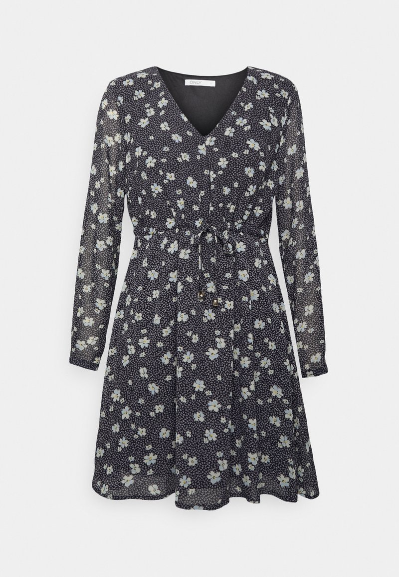 Robe noire à manches longues avec motif floral blanc, col en V et ceinture ajustable à la taille.