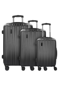 Tre valigie rigide nere di dimensioni diverse disposte insieme. Superficie texture con scanalature verticali, manici retrattili e quattro ruote ciascuna.