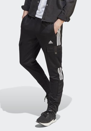 TIRO CARGO - Tracksuit bottoms - black/white