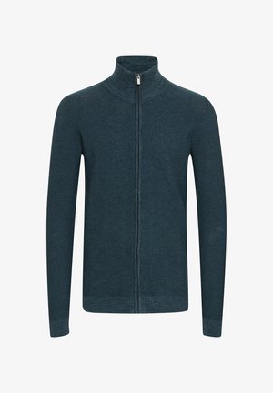 Strickjacke mit Reißverschluss in dunkelblaugrün, mit hohem Kragen, langen Ärmeln und geripptem Muster. Verfügt über einen zentralen Reißverschluss und eng anliegende Bündchen.