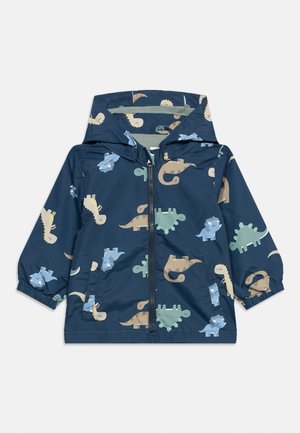 Παιδικό μπουφάν με κουκούλα σε ναυτικό μπλε χρώμα και φερμουάρ, με πολύχρωμες εκτυπώσεις κινουμένων σχεδίων δεινοσαύρων και ελαστικές μανσέτες στα μανίκια.