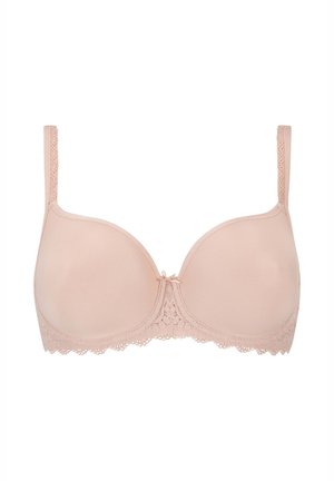 Reggiseno beige con tessuto liscio, coppe imbottite, dettagli in pizzo lungo i bordi e spalline regolabili. Fiocco centrale che aggiunge una decorazione sottile.