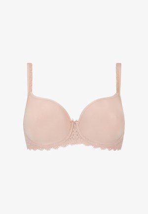 Beige rintaliivit, joissa on sileä kangas, toppatut kupit, pitsikoristeet reunoilla ja säädettävät olkaimet. Keskellä oleva rusetti lisää hienovaraista koristelua.