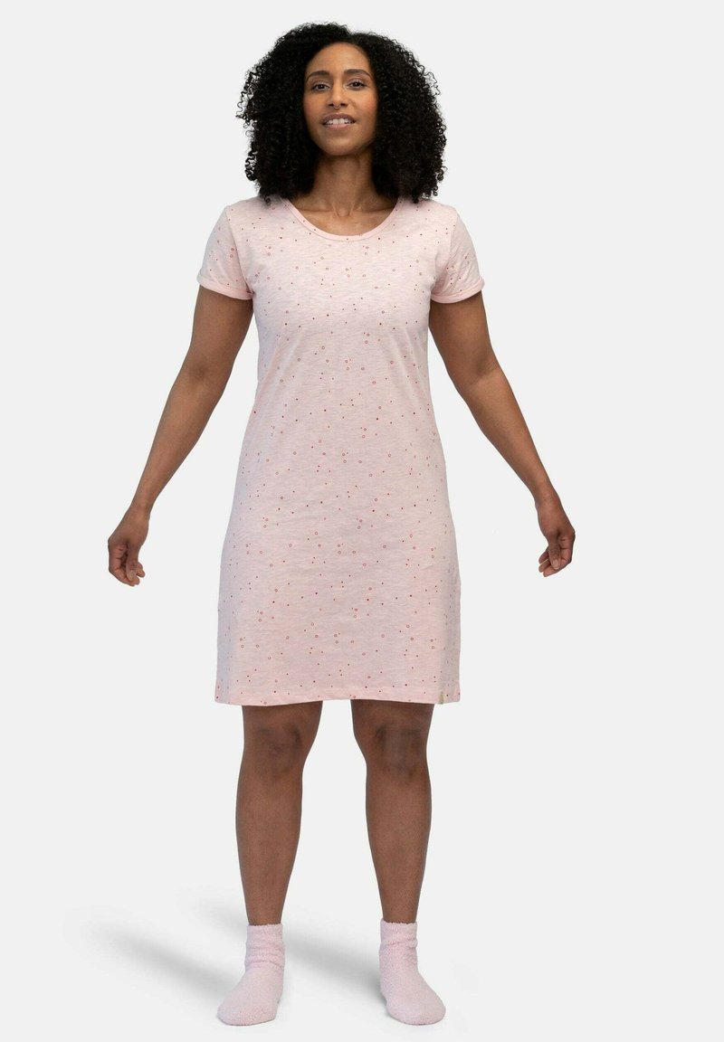 Pigiama da notte rosa a maniche corte con un delicato motivo a pois, realizzato in tessuto morbido, con scollatura rotonda e lunghezza fino al ginocchio.