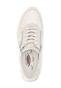 Light gray sneaker with a mix of soft fabric and synthetic materials, featuring a textured design, laces, and side zip for easy access.