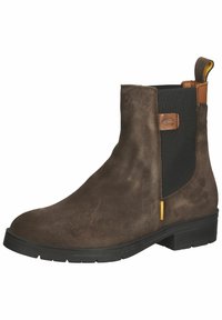 Braune Wildleder-Stiefeletten mit einer Gummisohle, elastischen Seiteneinsätzen und einer Lasche mit einem gelben Akzent für ein einfaches Anziehen.