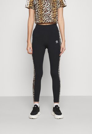 TIGHT - Leggingsit - black