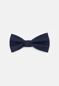 Noeud papillon bleu marine en tissu texturé, présentant une forme symétrique avec des extrémités larges et un nœud central. Pas de motifs ou d'accents visibles.
