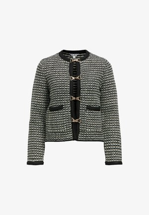 Giacca in tweed bianco e nero con scollatura rotonda, maniche lunghe e chiusure a toggles in metallo dorato. Presenta due tasche frontali.