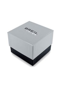 Boîte grise et noire avec une texture lisse ; le couvercle arbore le logo "BREIL TRIBE" en noir, au design épuré, en forme de cube.