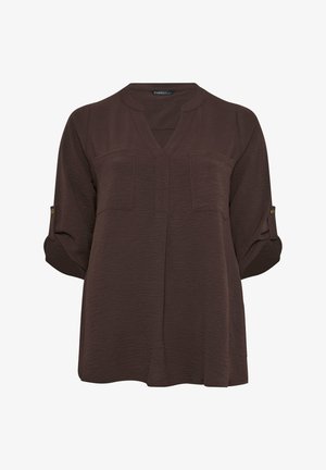 Donkerbruine blouse met lange mouwen, opgerolde mouwen met knoopsluiting, V-hals en twee borstzakken van textuurrijk stof.