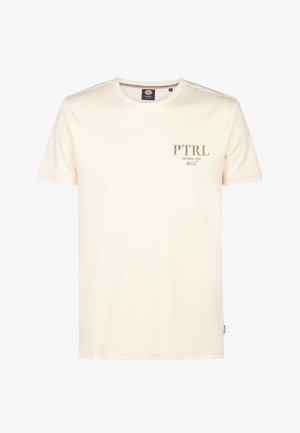 Cremefarvet bomulds T-shirt med korte ærmer, rund hals og et frontlogo i brune bogstaver. Blødt stof, afslappet pasform.