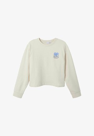 Sudadera de algodón color crema, diseño corto, de mangas largas, con puños acanalados, que presenta un corazón azul y un estampado gráfico en el lado izquierdo del pecho.