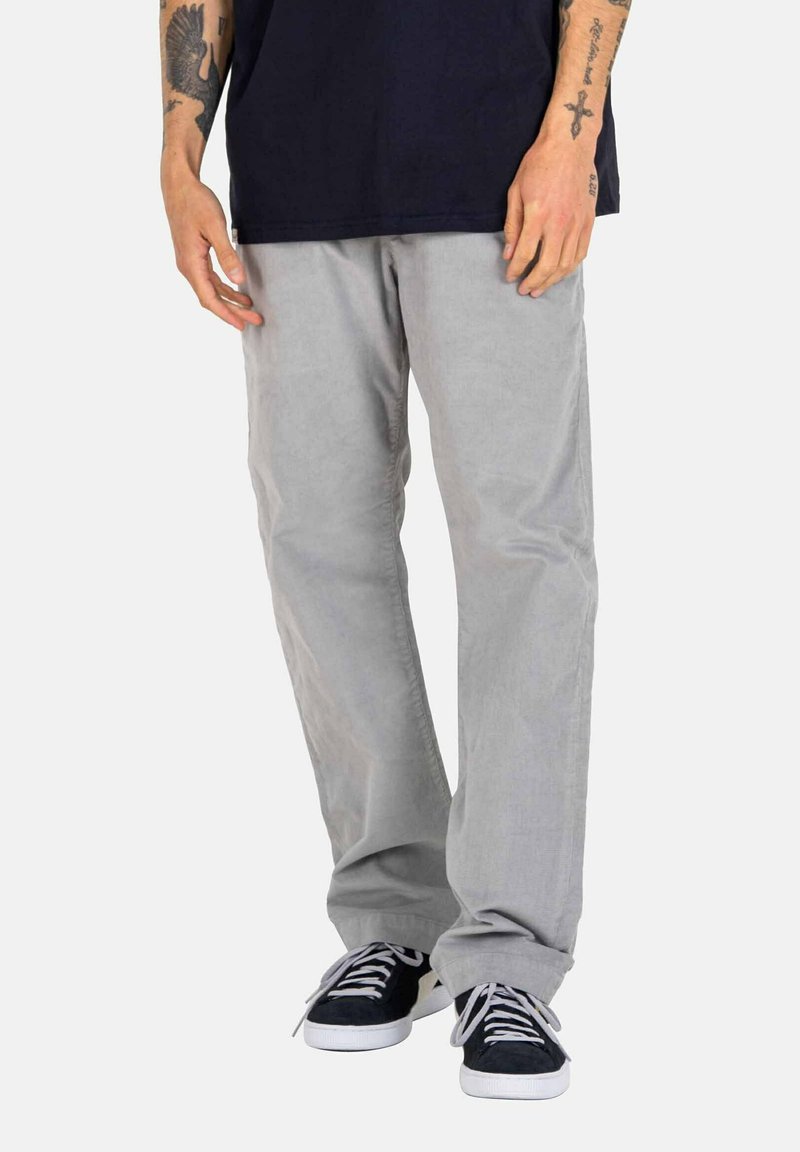 Light gray pants with a relaxed fit, made of soft fabric, featuring a smooth texture, side pockets, and subtle stitching details.
