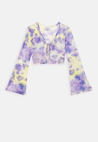 Cropped top with a V-neck and tie closure, featuring purple, yellow, and white tie-dye patterns. Long, flared sleeves with lace details.