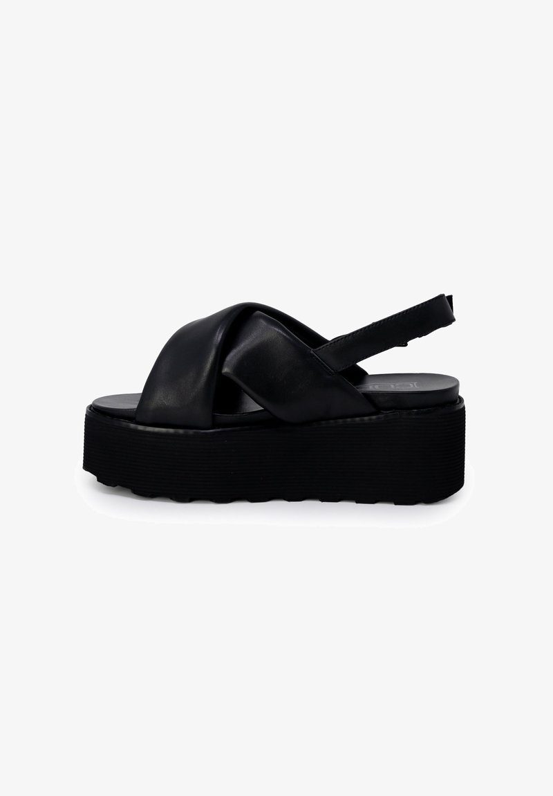 Sandali platform neri con un superiore in pelle liscia, design annodato e cinturino posteriore regolabile su una suola testurizzata per una maggiore aderenza.