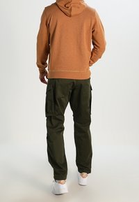 G-STAR Jersey con capucha - mustard yellow