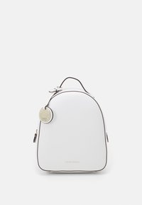 White leather backpack with a rounded shape, contrasting dark edging, and a metallic hardware accent. Features a small tag attached to the side.