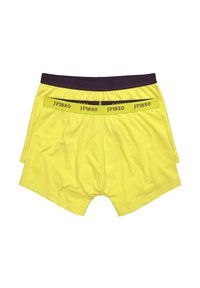 Bañadores amarillos con una cinturilla morada, que presentan el nombre de la marca "JP1880" impreso en la cinturilla y están hechos de una tela suave y elástica.