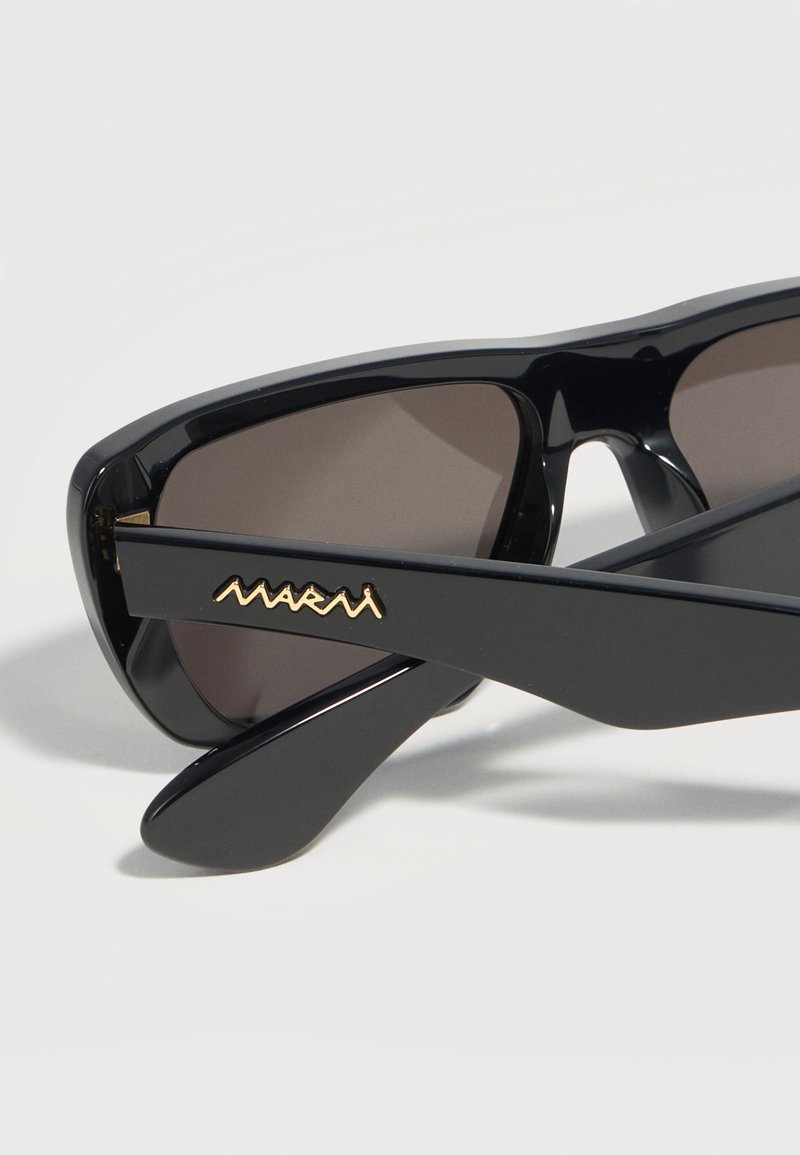 Black rectangular sunglasses with dark lenses and a gold "Marni" logo on the temple arm against a white background.
