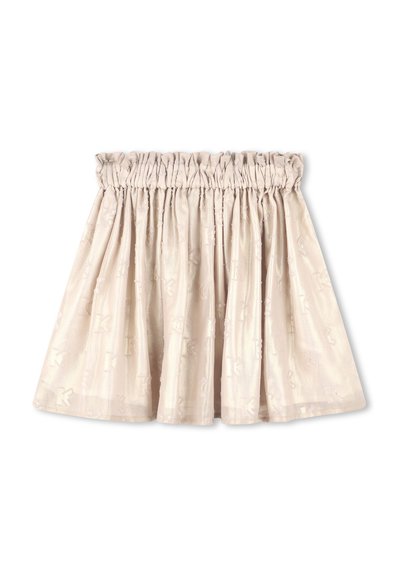 Jupe beige clair avec une taille élastique froncée, présentant un motif gaufré subtil et une texture fluide.