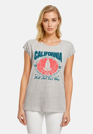 Gray short-sleeve t-shirt featuring a vibrant graphic print with "California" text, palm trees, a skull, and surfboard accents.