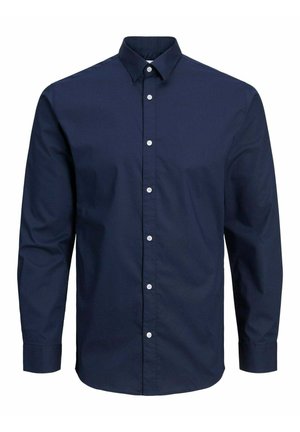 Camicia blu navy con bottoni realizzata in un tessuto testurizzato, dotata di colletto a punta e maniche lunghe con polsini abbottonati.