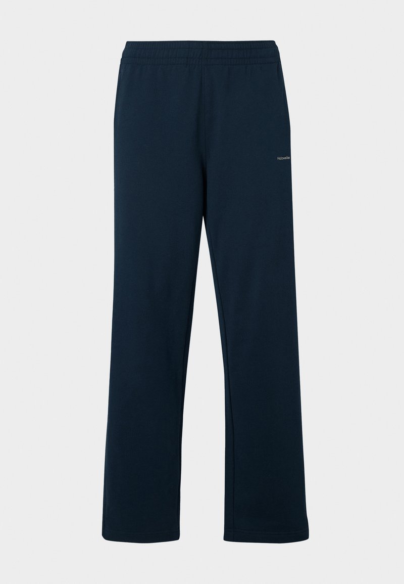 Un pantalon de survêtement bleu marine en tissu doux, avec une taille élastique et une coupe ample. Pas de motifs visibles ni de détails métalliques.