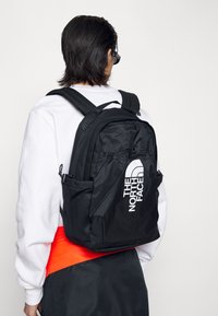 bozer backpack the north face Cinch Online including a large main compartment The North Face Bozer Mini