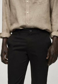 Mango Chinos - black