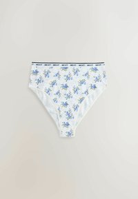 Culotte blanche taille haute pour femme avec motif floral bleu et jaune, ceinture élastique avec marquage répété "NEXT" en noir.