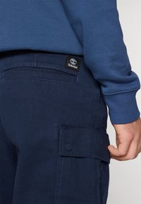 Timberland BROOKLINE PANT  - Cargo trousers - dark sapphire