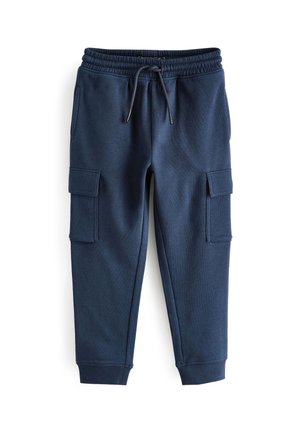 Pantalon de jogging bleu marine avec taille élastique, cordon de serrage, poches cargo latérales avec rabats et poignets côtelés aux chevilles.
