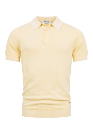 Lys gul kortærmet strikket polo med ribbet kant og manchetter, to-knaps slids og en hvid krave.
