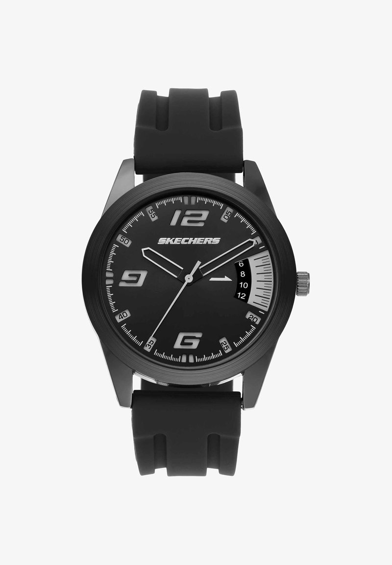 Reloj de pulsera Skechers negro con grandes números 12, 9, 6, marcadores de minutos blancos, pantalla de fecha y correa de silicona negra.
