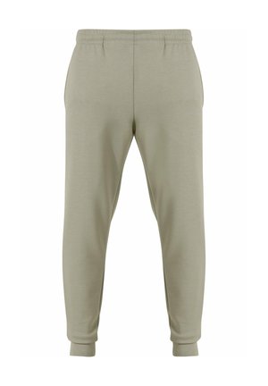 Jogging léger vert clair à coupe décontractée, taille élastique et chevilles resserrées. Fabriqué en matière douce, avec une texture lisse et sans motifs.