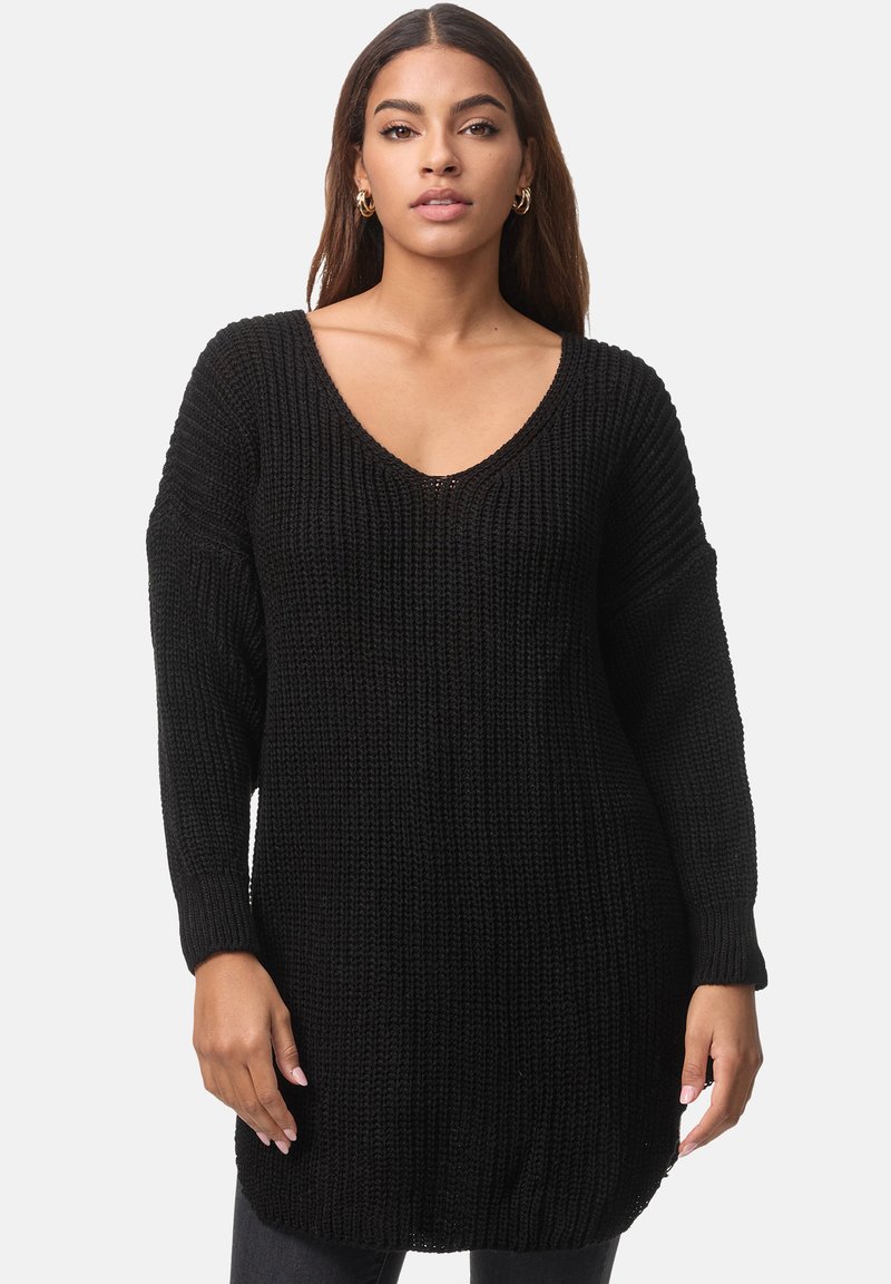 Schwarzer Strickpullover mit tiefem V-Ausschnitt, langen Ärmeln und gerippter Textur, der einen lockeren Schnitt und Seitenschlitze am Saum aufweist.