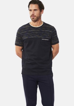 Navy short-sleeve T-shirt with a patterned top section in yellow and blue. Features a pocket and brand logo on the chest. Soft fabric texture.