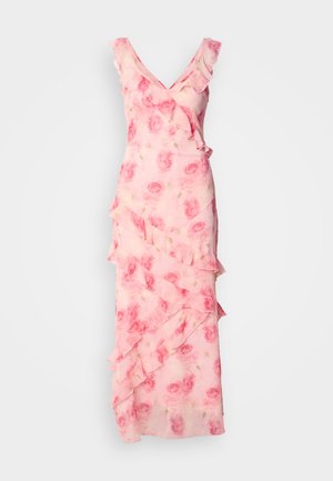 Pink floral-printed dress with ruffles along the neckline and skirt. Flowing fabric, V-neck design, and a fitted silhouette with layered detailing.