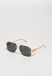 Ausgewählt, gold-coloured