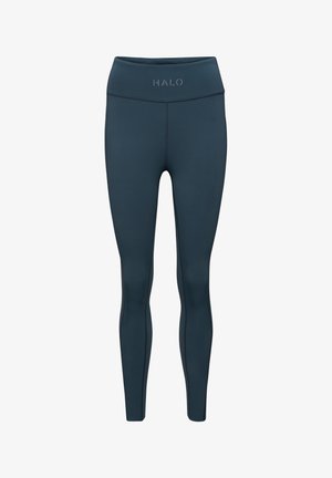 Navy leggings met een hoge tailleband, voorzien van een subtiel logo en platte naden voor comfort. Glad textuur en sportieve pasvorm.