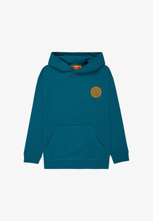 Sininen huppari etutaskulla ja keltaisella auringon kuvalla. Yhdistetty harmaisiin leveälahkeisiin farkkuihin ja mustiin lenkkareihin. Rentoa, väljä istuvuus.