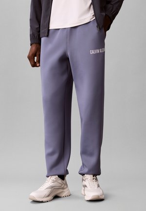 Calvin Klein, BREATHABLE PERFORMANCE JOGGERS - Долнище на анцуг - stone hard blue