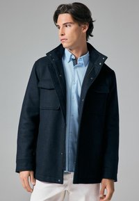 Next Jas - navy blue texture