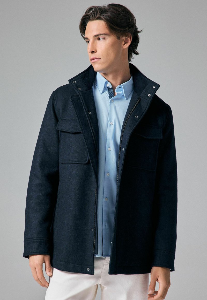 Next Jas - navy blue texture