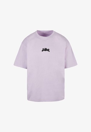 Svetlofialové bavlnené tričko s voľným strihom, na prednej hornej časti hrudi s čiernym stylizovaným logom "Lost Youth".